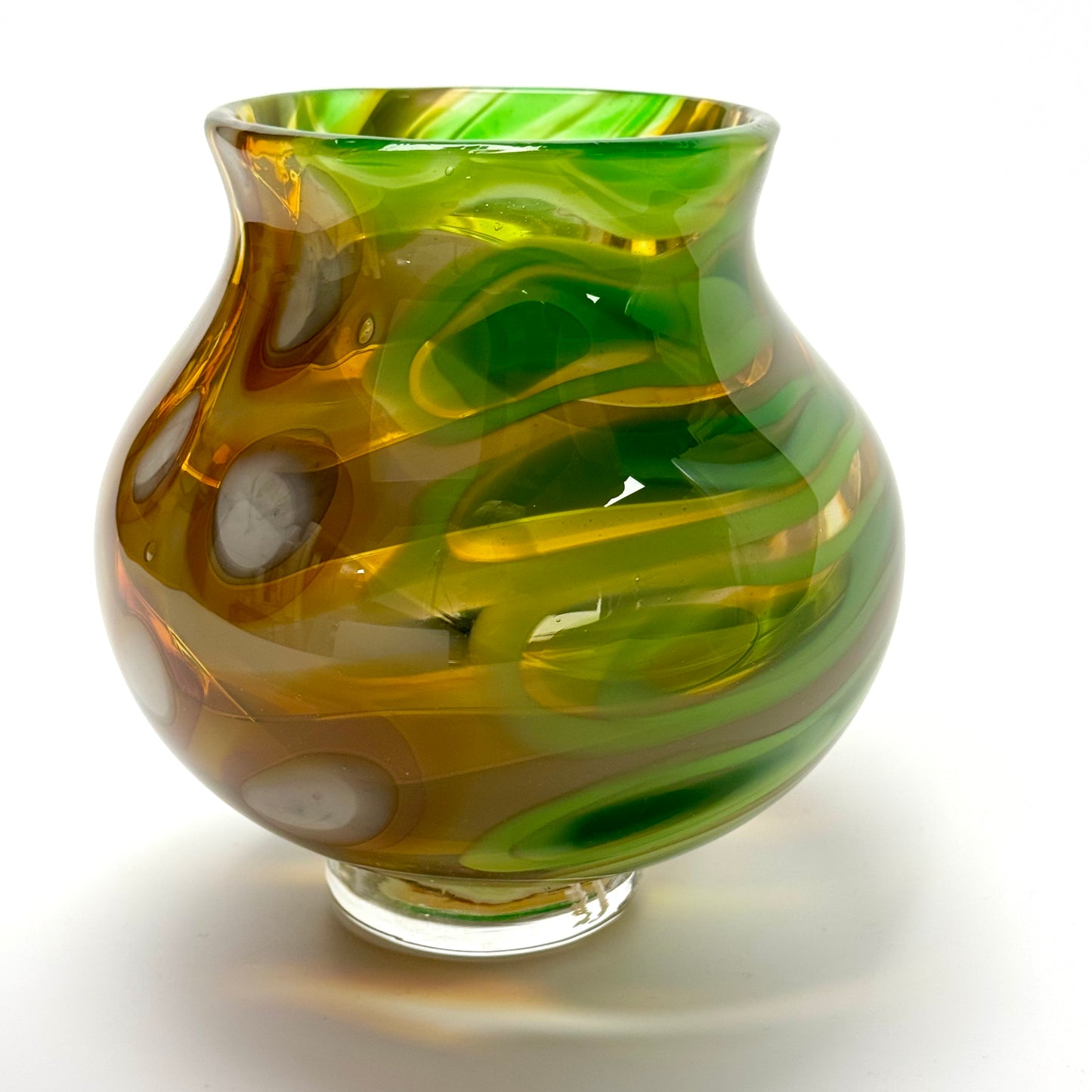 Green, gold, and brown handblown glass art vase