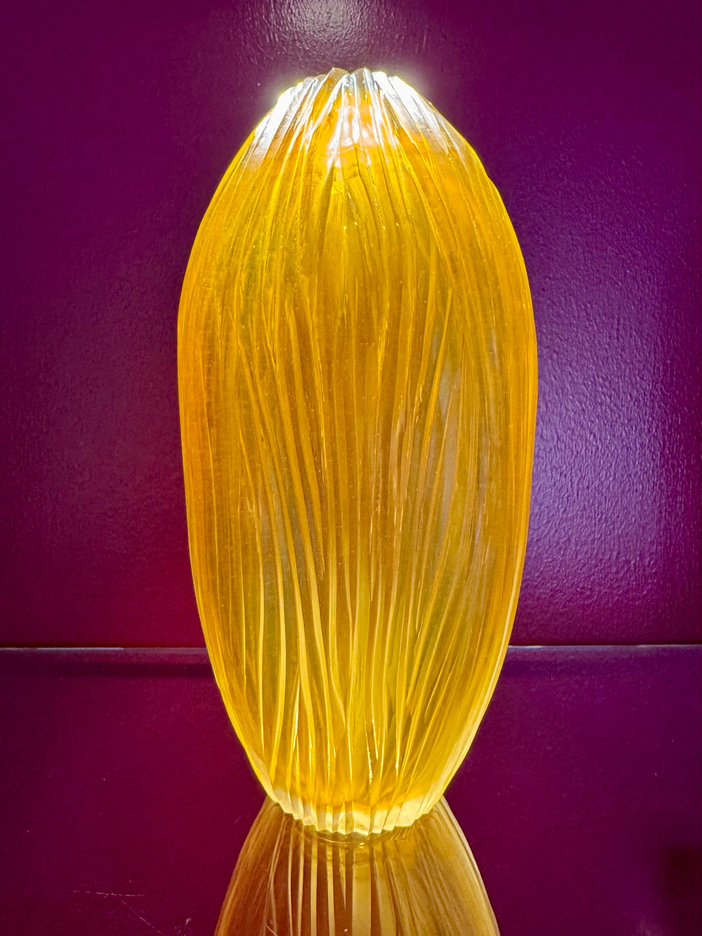 Handblown and hand-engraved gold glass vase