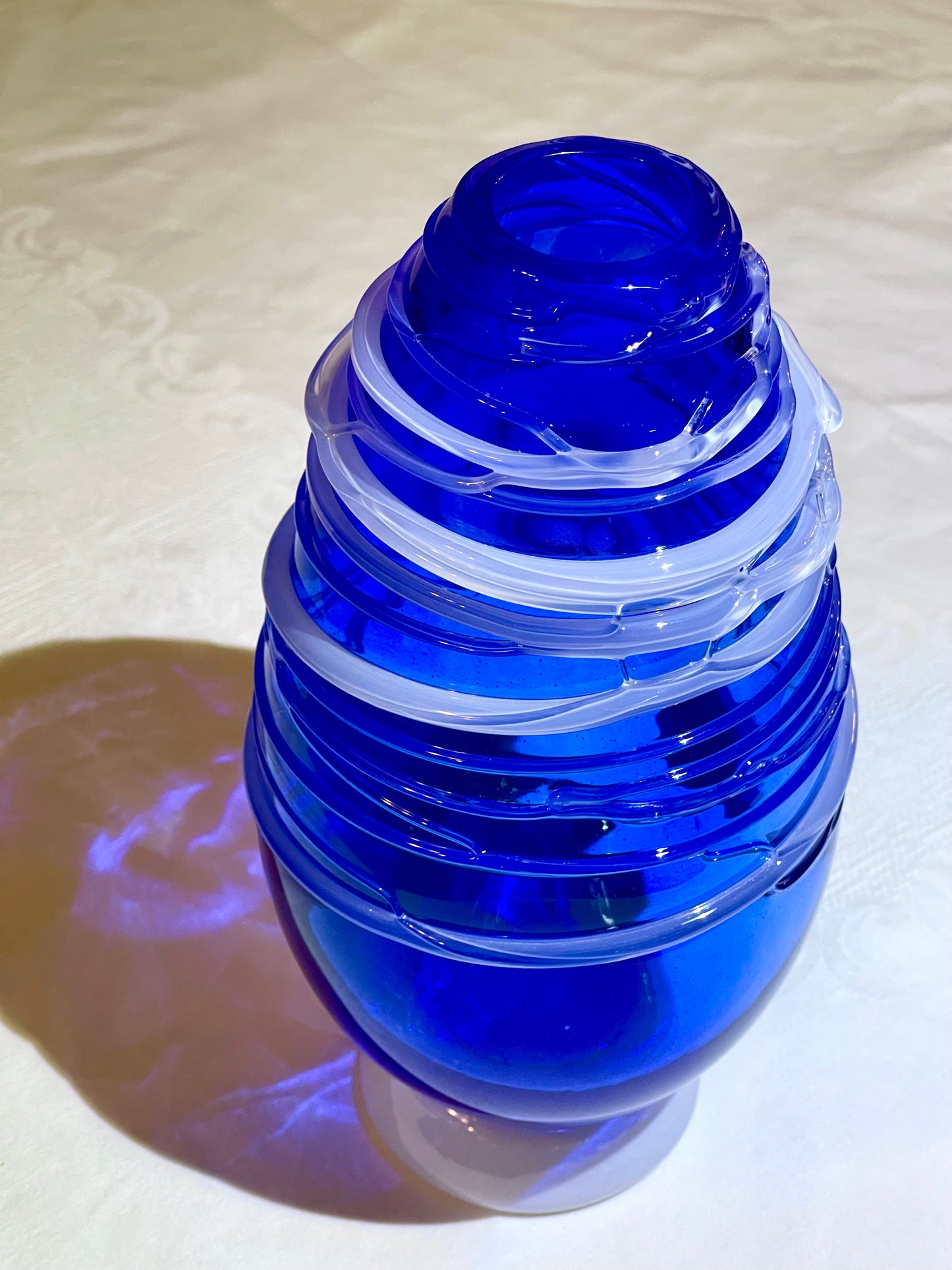 Handblown cobalt blue vase with opaline wrap