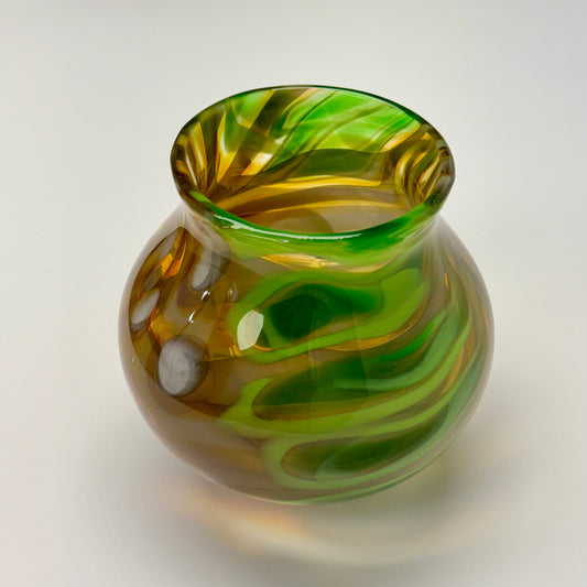 Green, gold, and brown handblown glass art vase