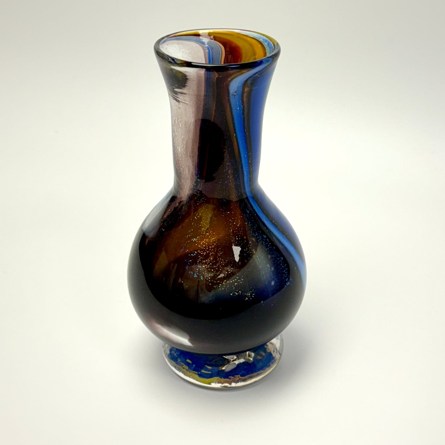 Rainbow-colored handblown glass art vase