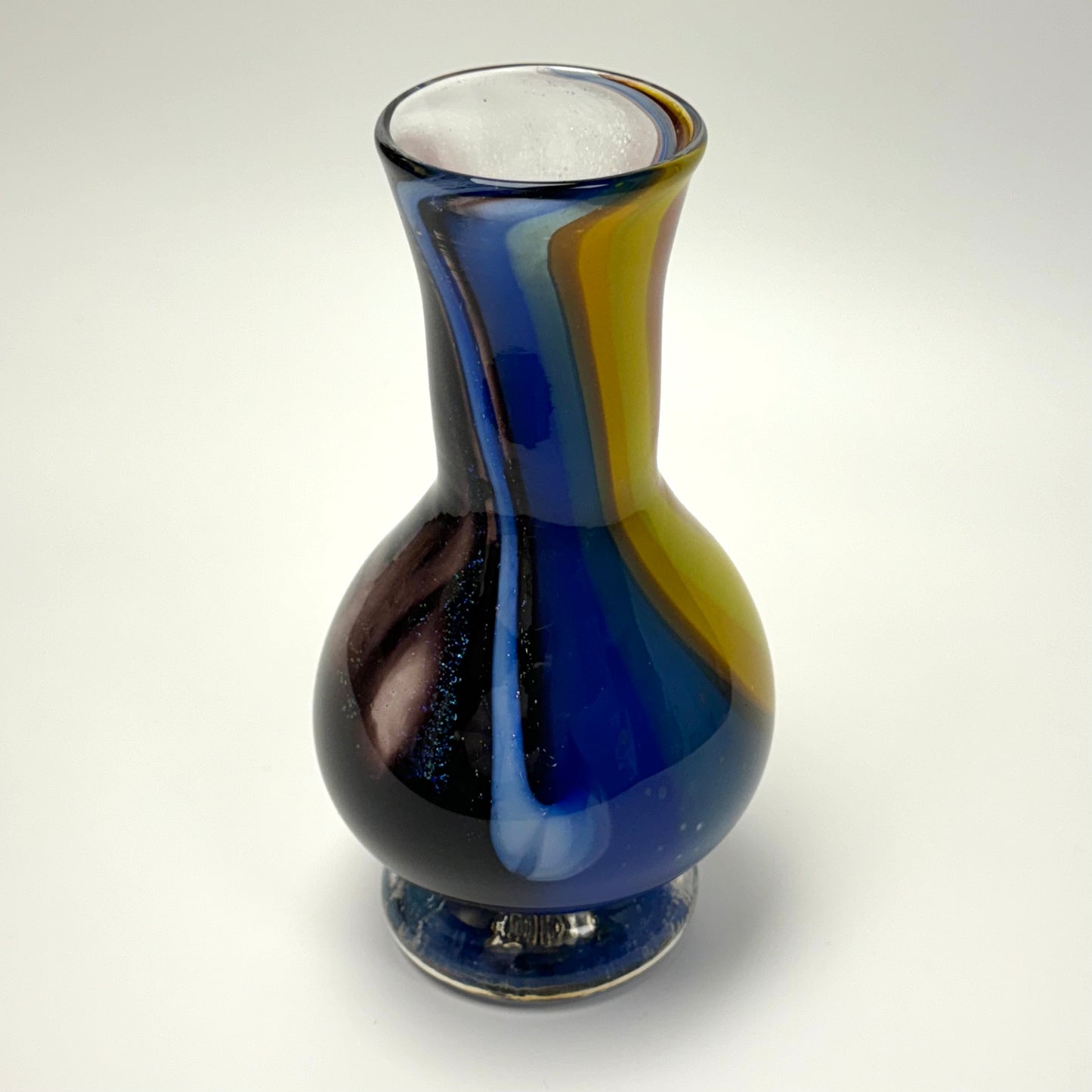Rainbow-colored handblown glass art vase