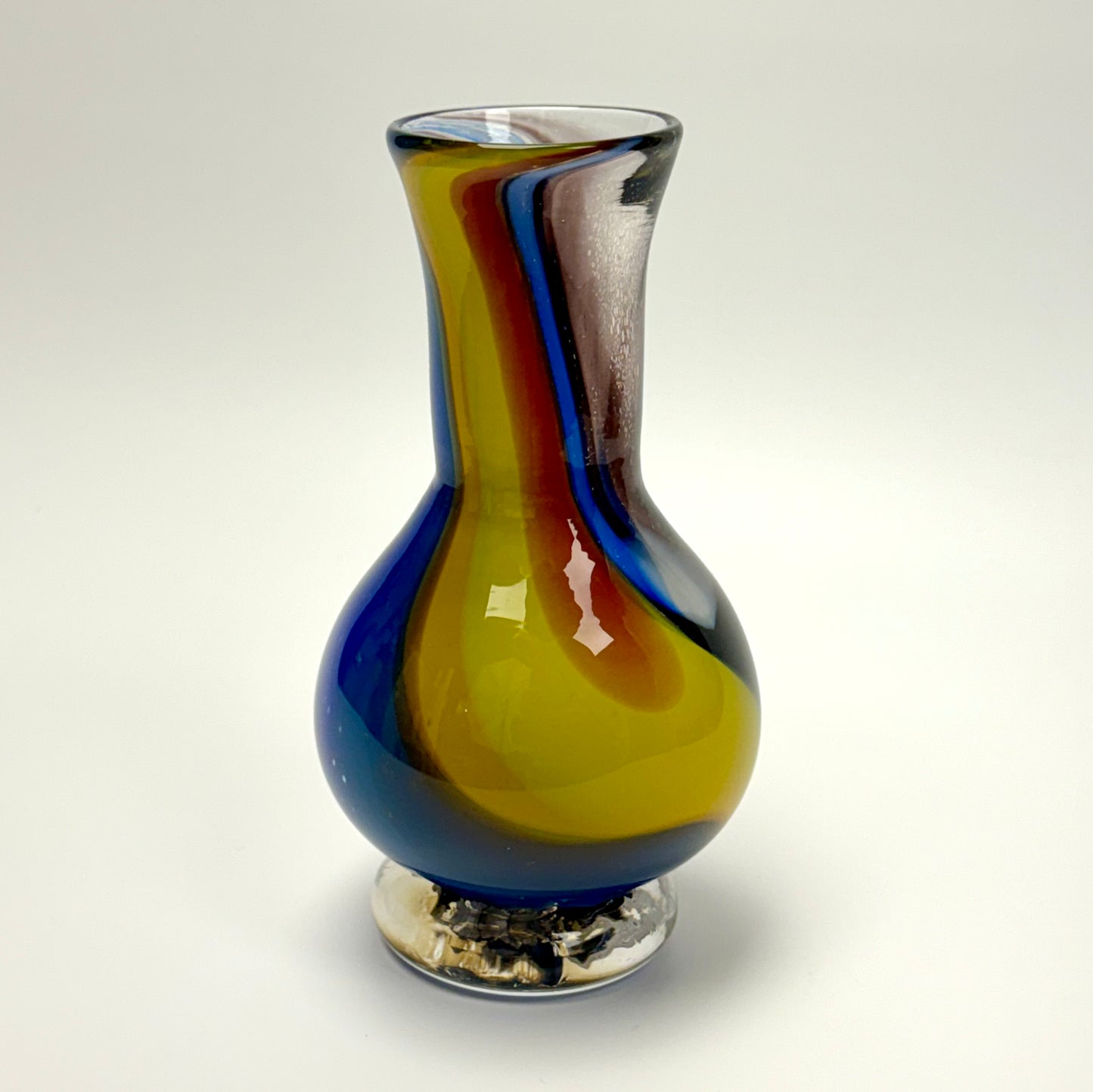 Rainbow-colored handblown glass art vase
