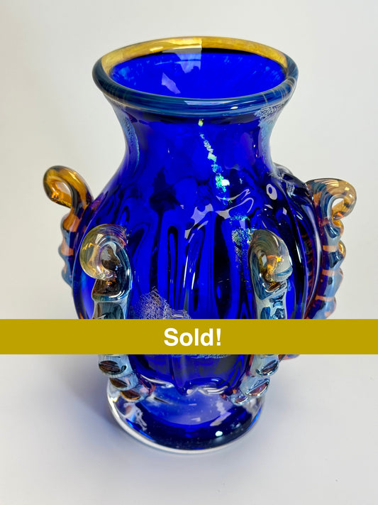 Handblown blue, gold, and dichroic glass vase