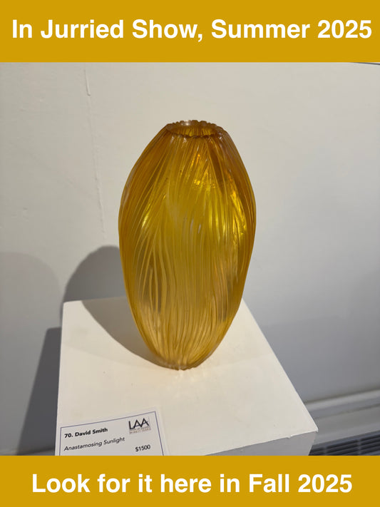 Handblown and hand-engraved gold glass vase
